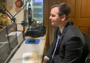 Spiros Law Attorney Jordan Butler at the radio station