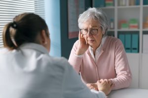 woman talking to doctor symptoms of elmiron