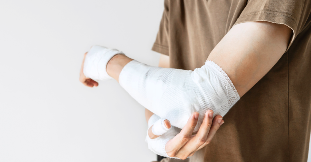 bandages on person arms and hands