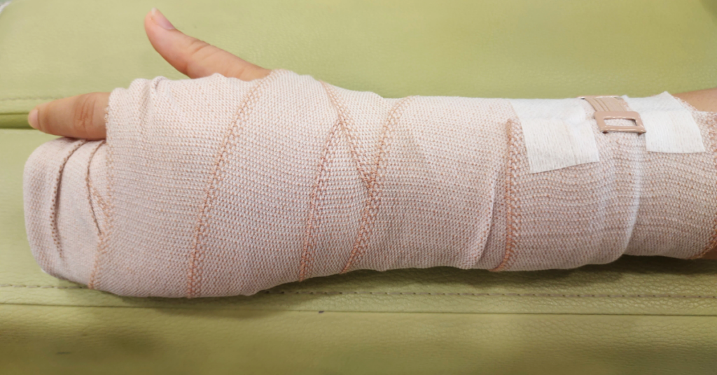 person with arm bandages