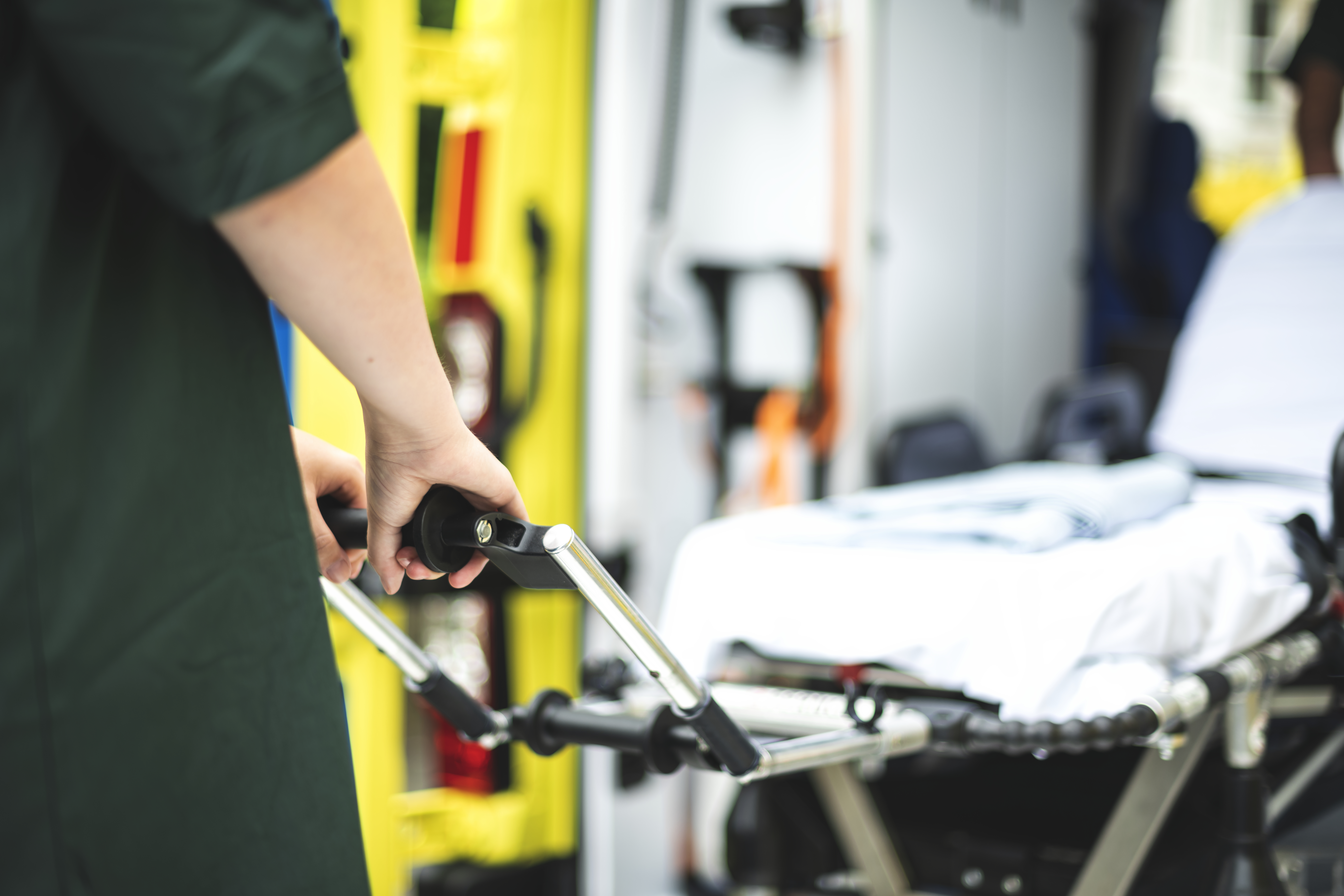 Paramedics at work with an ambulance